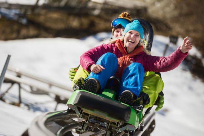 Rodeln im Winterurlaub in Flachau, Salzburger Land